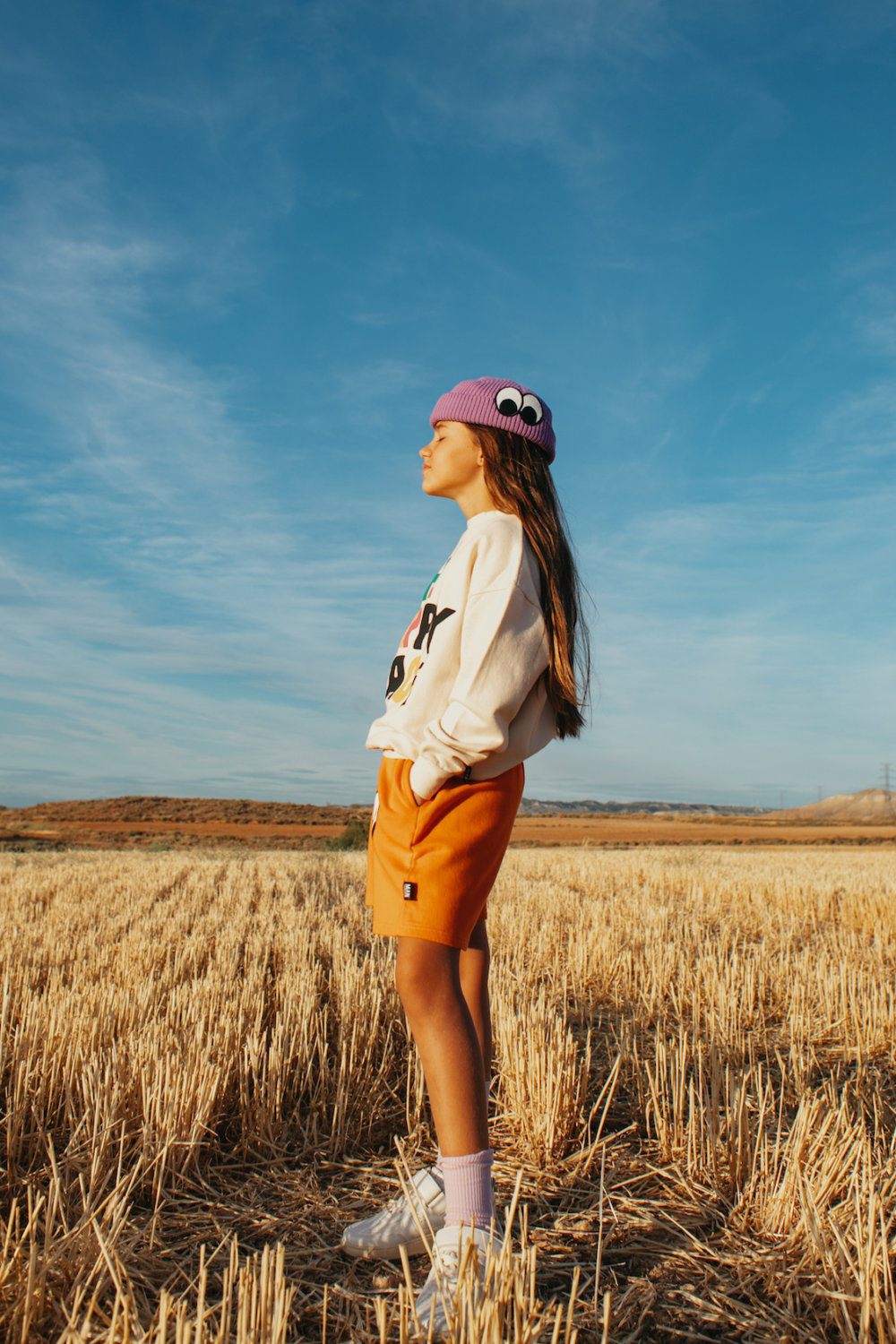 impressive orange shorts trendy white sweater