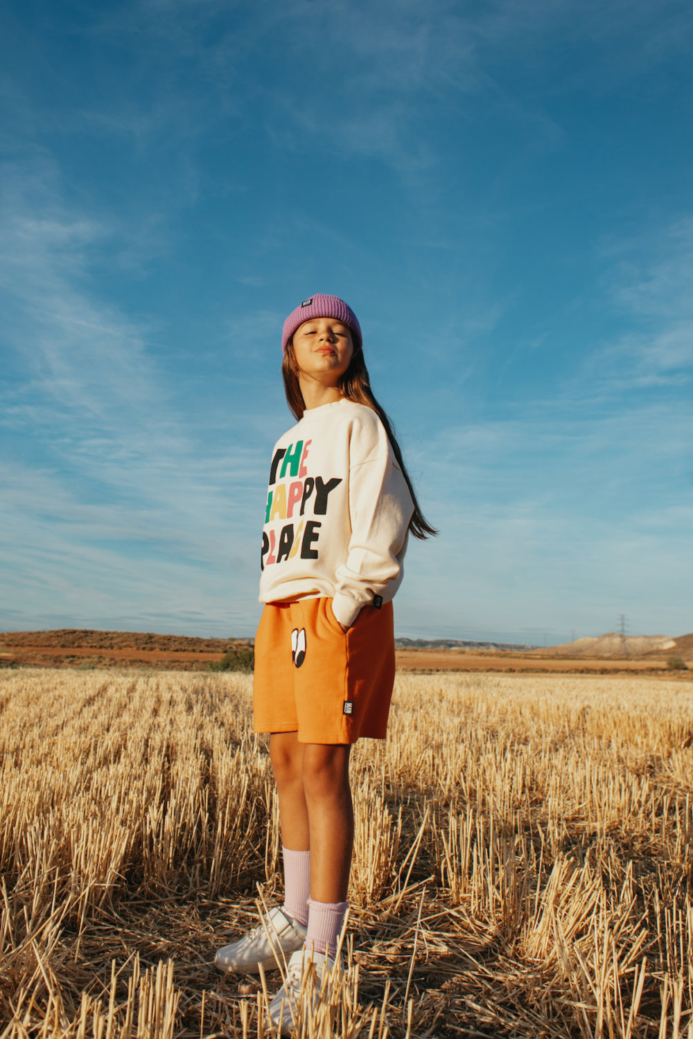 impressive orange shorts trendy white sweater