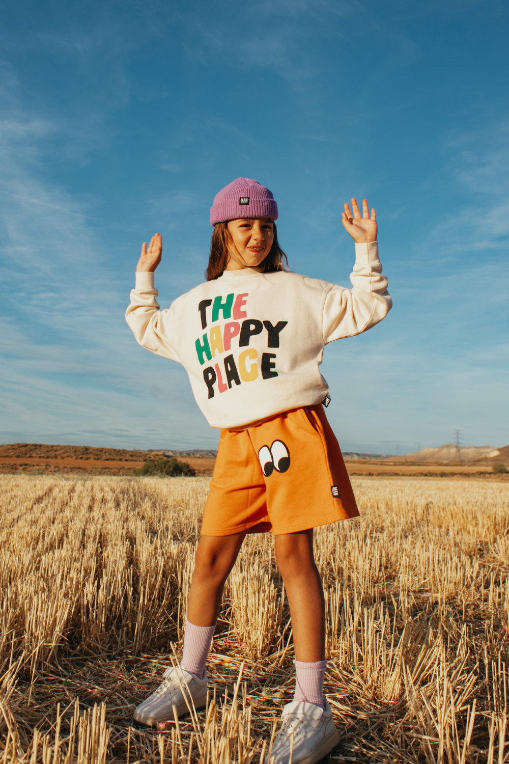 impressive orange shorts trendy white sweater