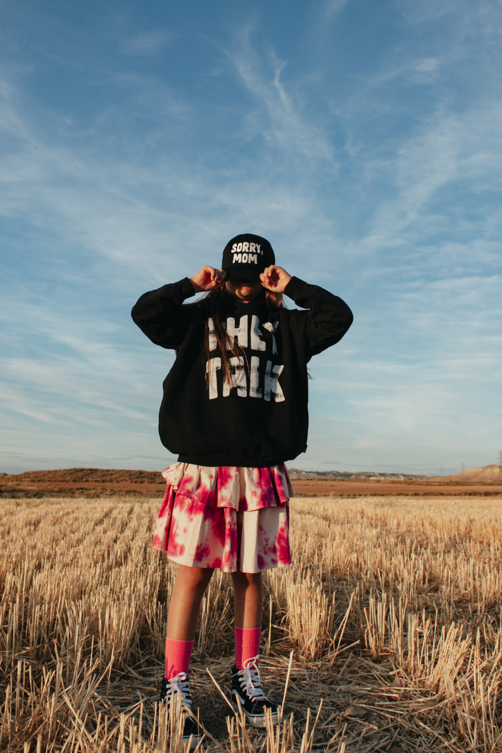 iconic colored skirt in vogue black hoodie