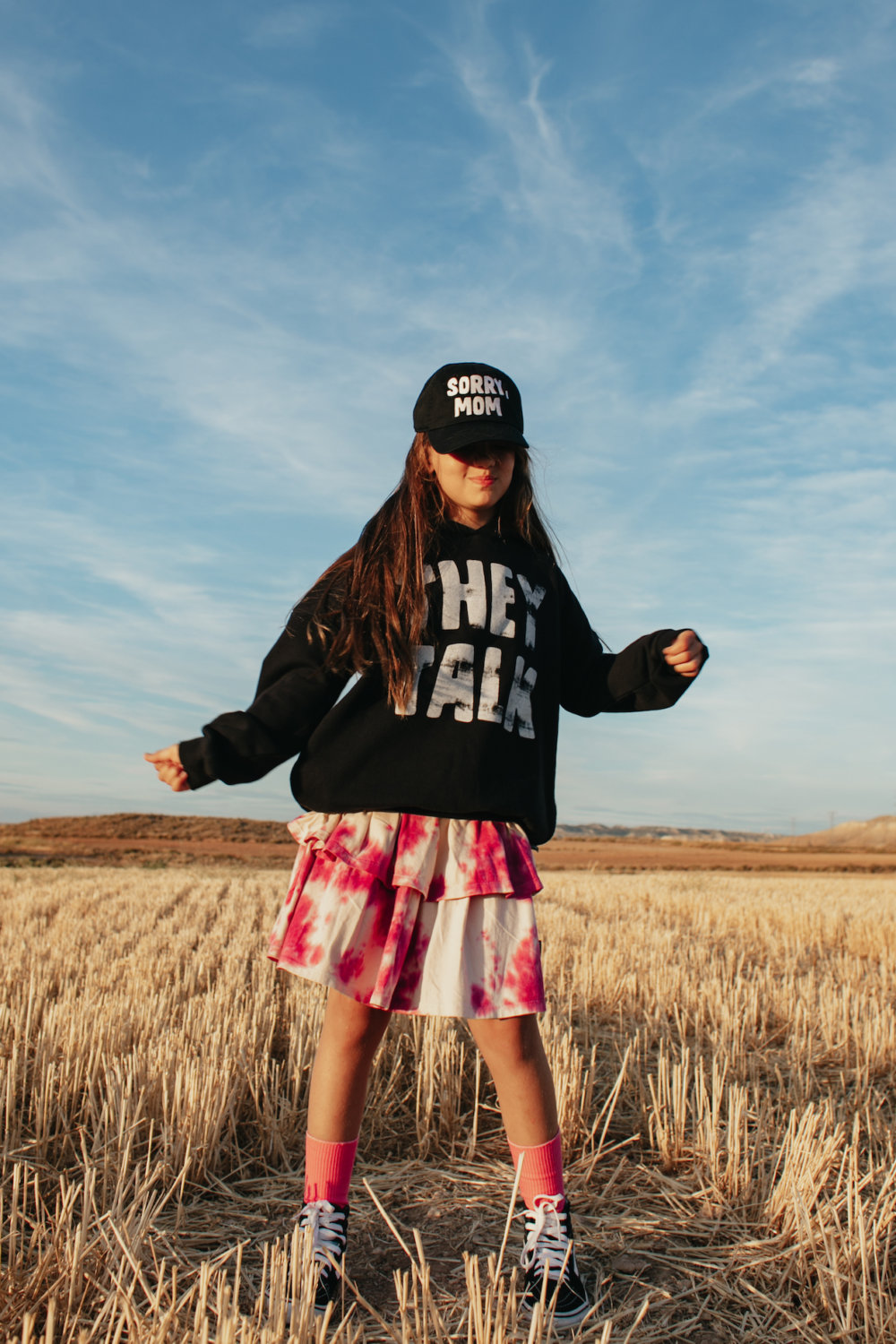 iconic colored skirt in vogue black hoodie