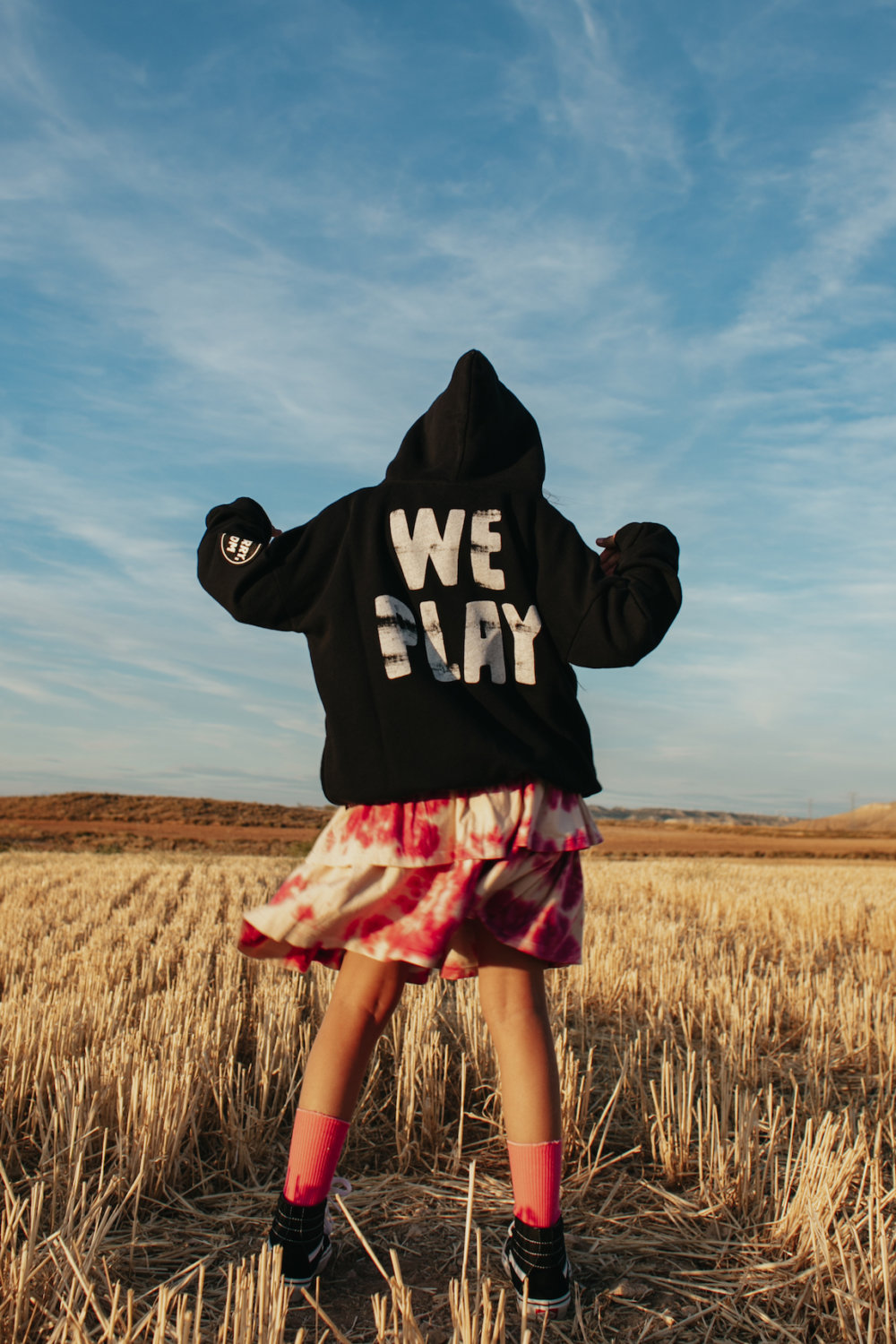 iconic colored skirt in vogue black hoodie