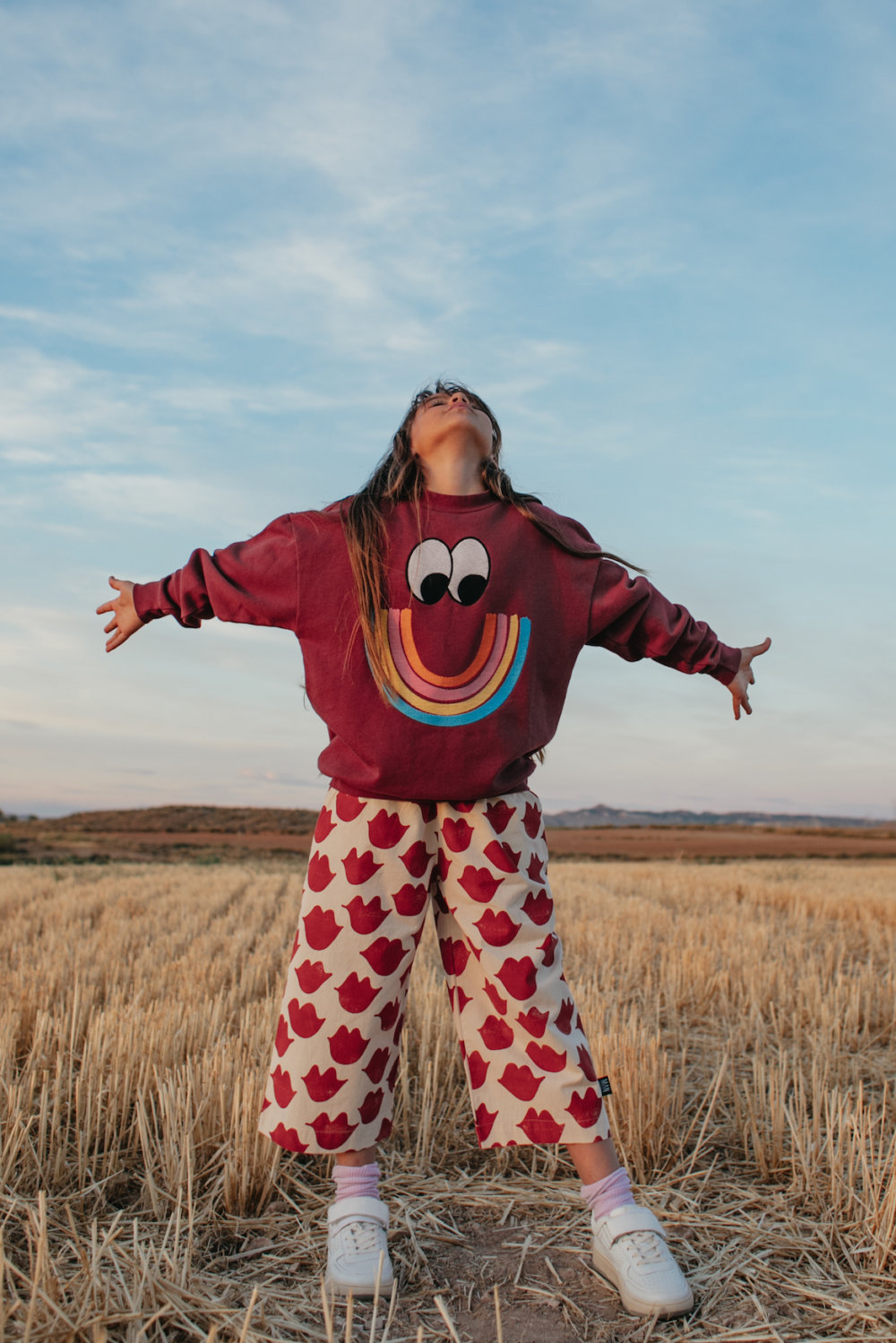 striking red sweater sensational trendy pants