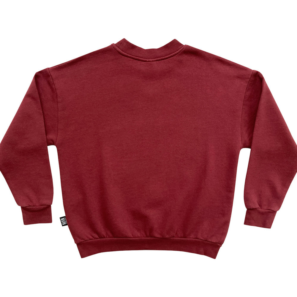 striking red sweater back