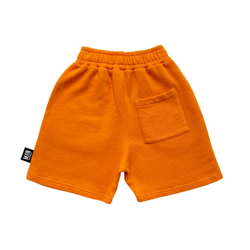 orange kids shorts back