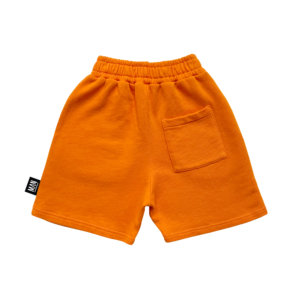 orange kids shorts back
