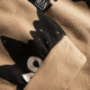 brown organic sweater detail label