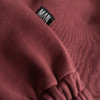 red unisex pants details label