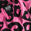 pink leo leggings detail label