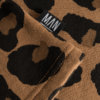 brown leo sweater detail label