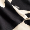 black sweater dress detail label